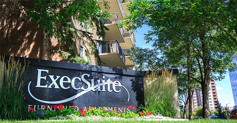 ExecSuite Furnished Apartments sign